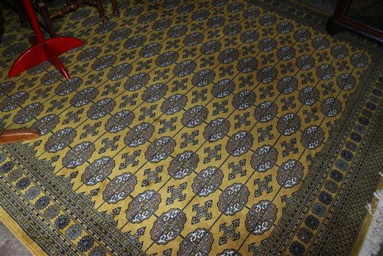 Bokhara pattern gold ground carpet